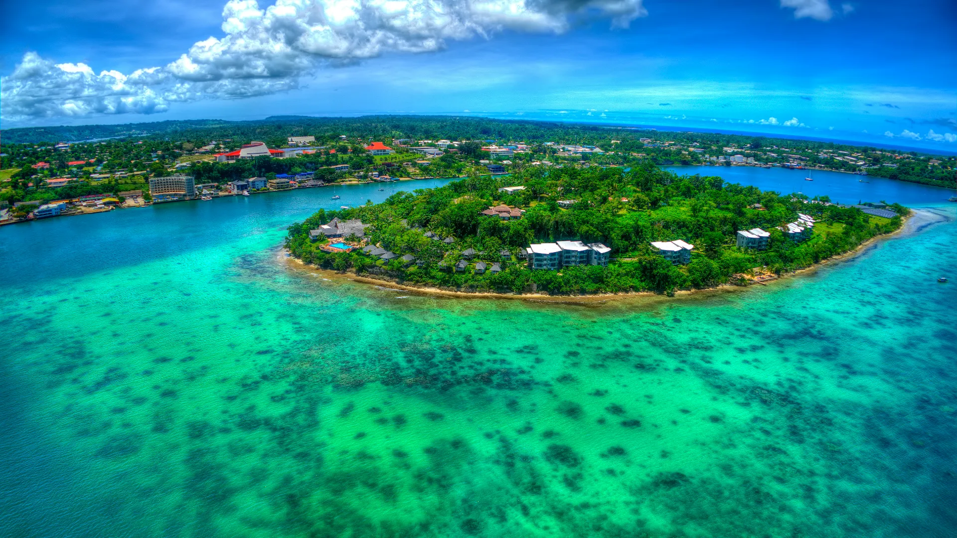 Photo aerial view of Port Vila Bay, Vanutu, where the Pacific Island Students first campaigned for climate legal protections which ended in the 2025 landmark advisory opinion by the International Court of Justice to protect our climate and environment under international law.