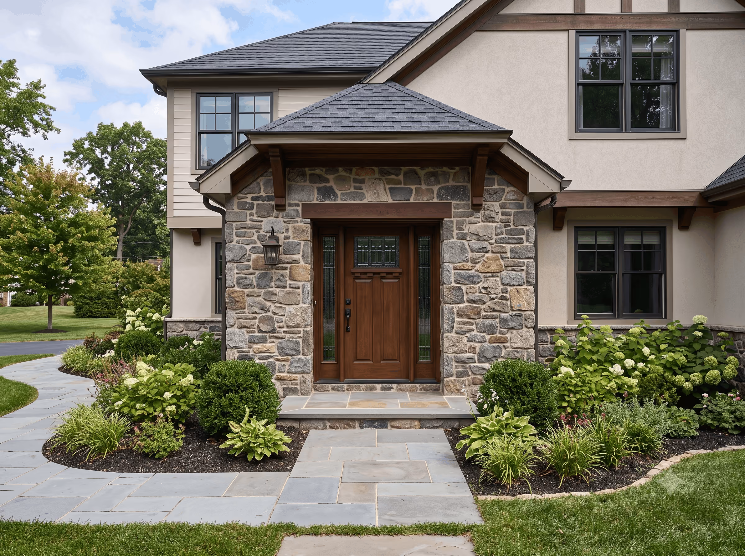 Residential exterior featuring stone masonry.