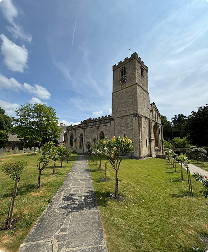 Saint Mary's church in Bibury. The village that also has The Catherine Wheel pub, The Swan in Bibury, Bibury Trout farm and Eleven Cafe and Restaurant.