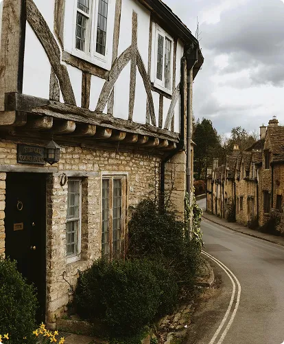 A traditional beamed cottage, The Old Court House located in the Cotswold village of Castle Combe.