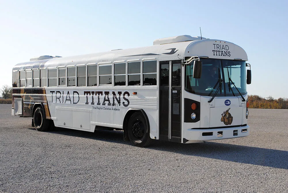 Triad Titans wrapped bus