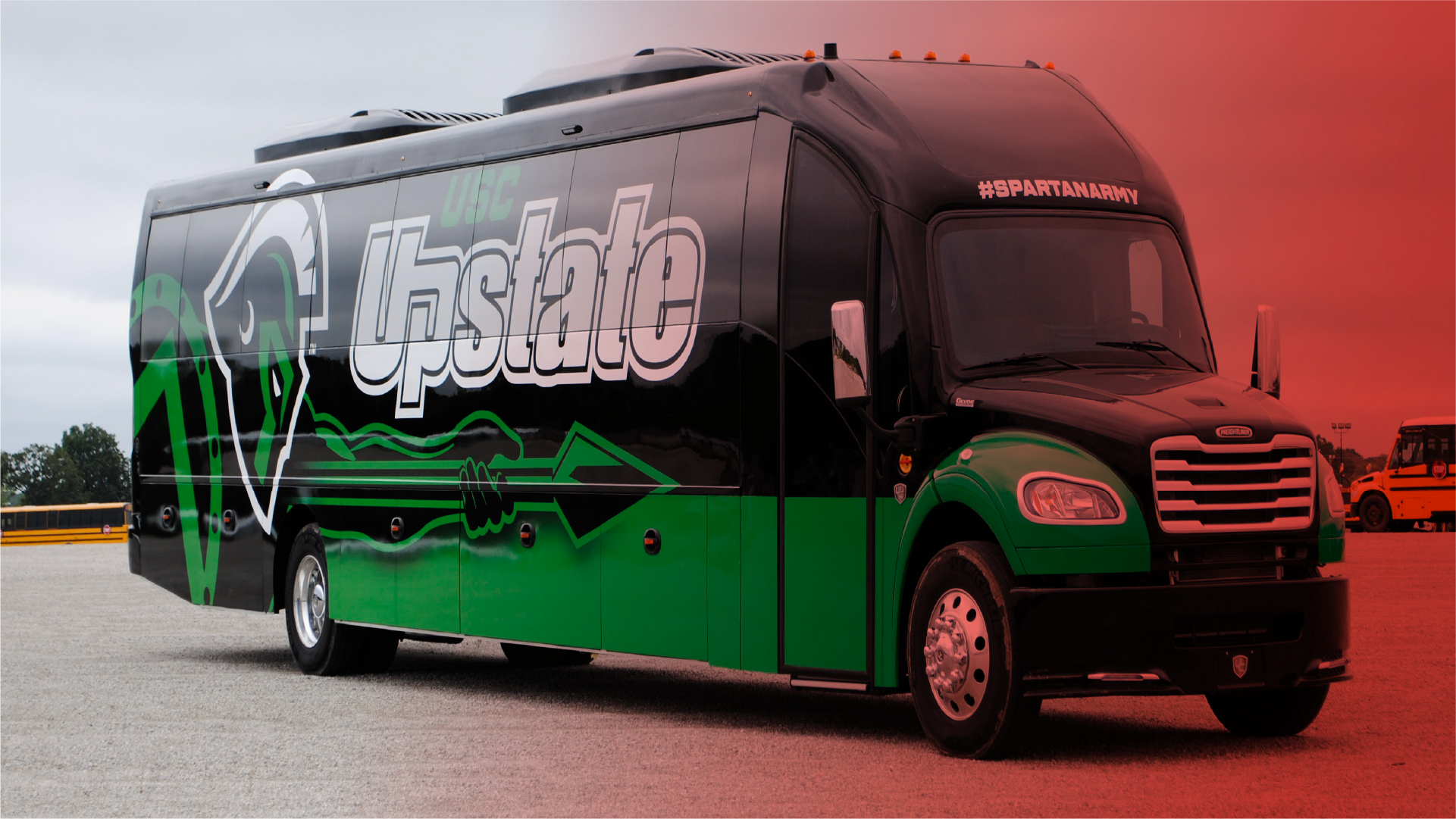 Custom-wrapped fleet vehicle in front of the National Wrap Co. shop, Tulsa