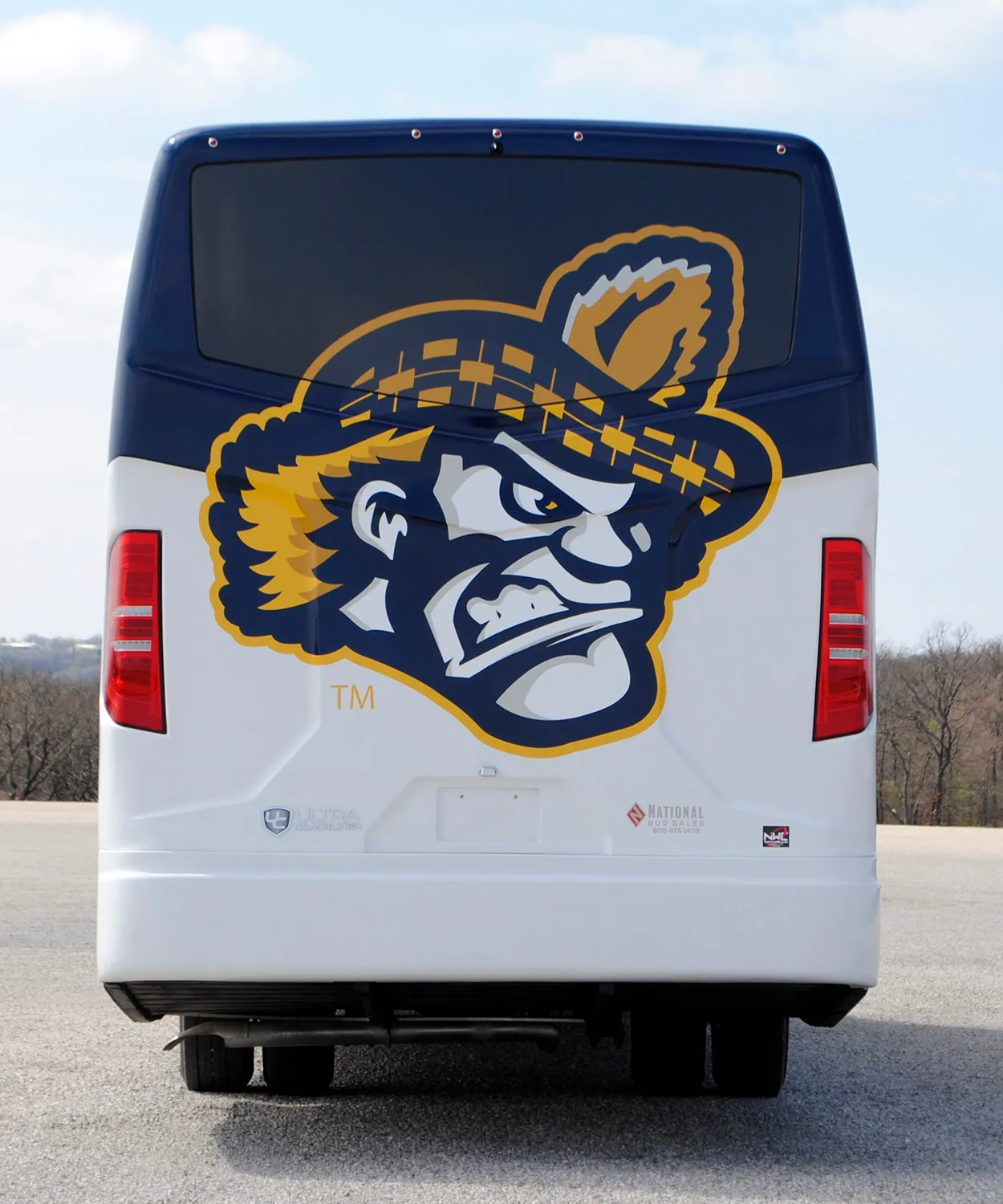 Rear view of a Highland Park Scots Ultra Coachliner wrapped by National Wrap Co.