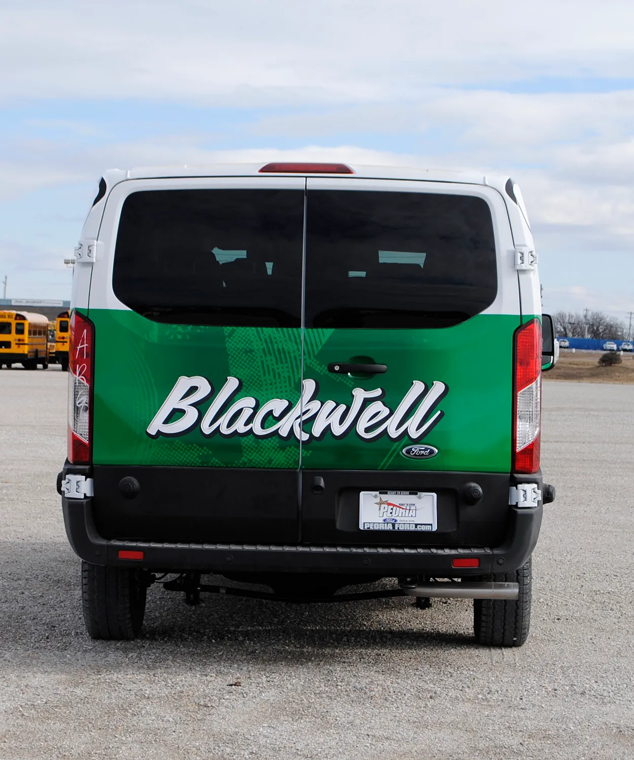 Rear view of a Blackwell shuttle wrapped by National Wrap Co.