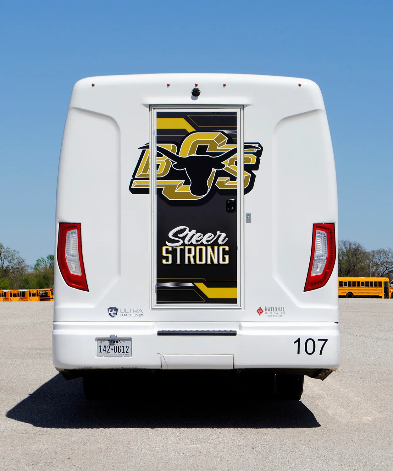 Rear view of a BSS Steer Ultra Coachliner wrapped by National Wrap Co.