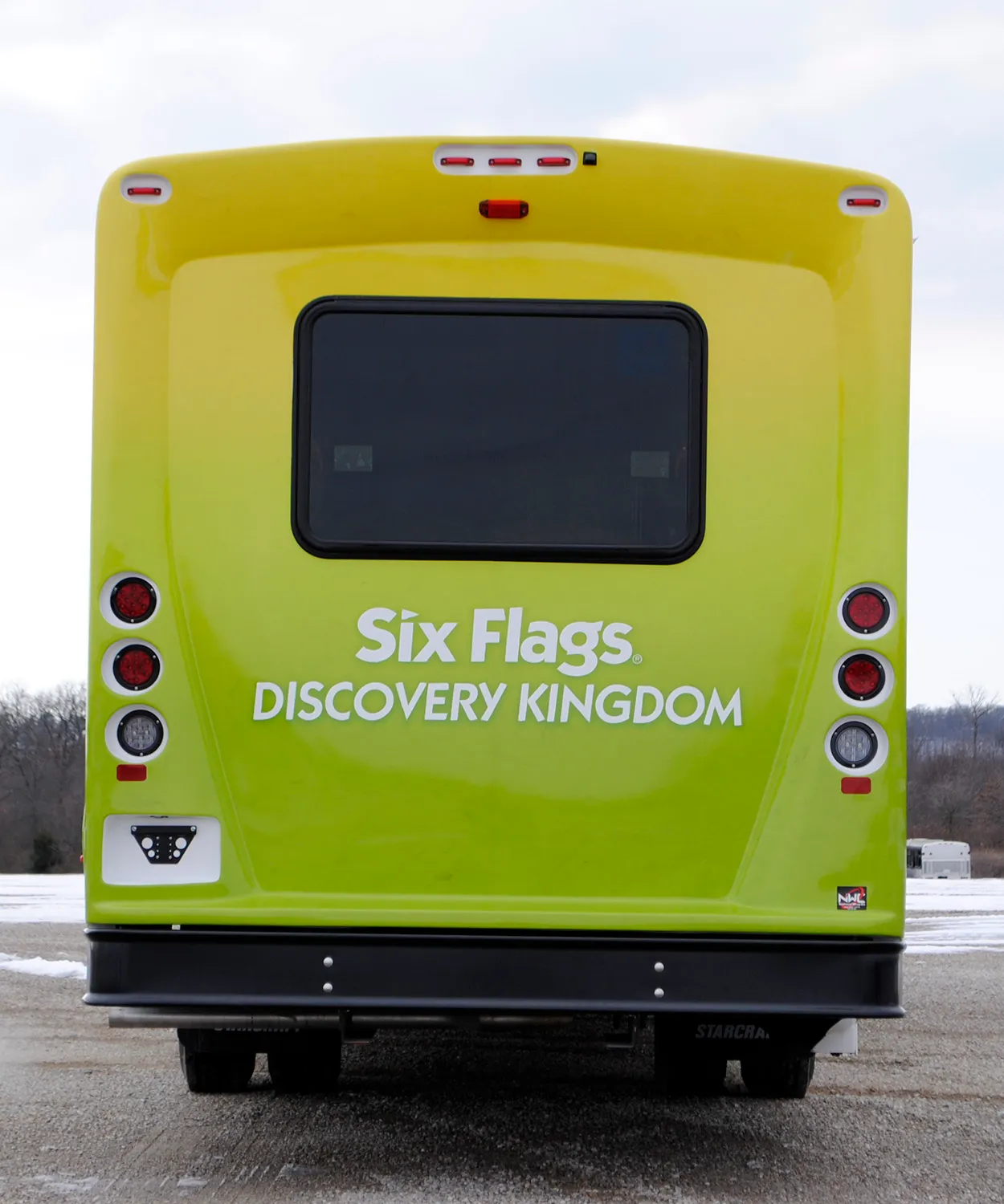 Rear view of a Six Flags Discovery Kingdom shuttle wrapped by National Wrap Co.