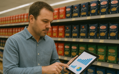 Category manager analysant un tableau de bord sur tablette devant un rayon pour optimiser l’assortiment et la performance en magasin