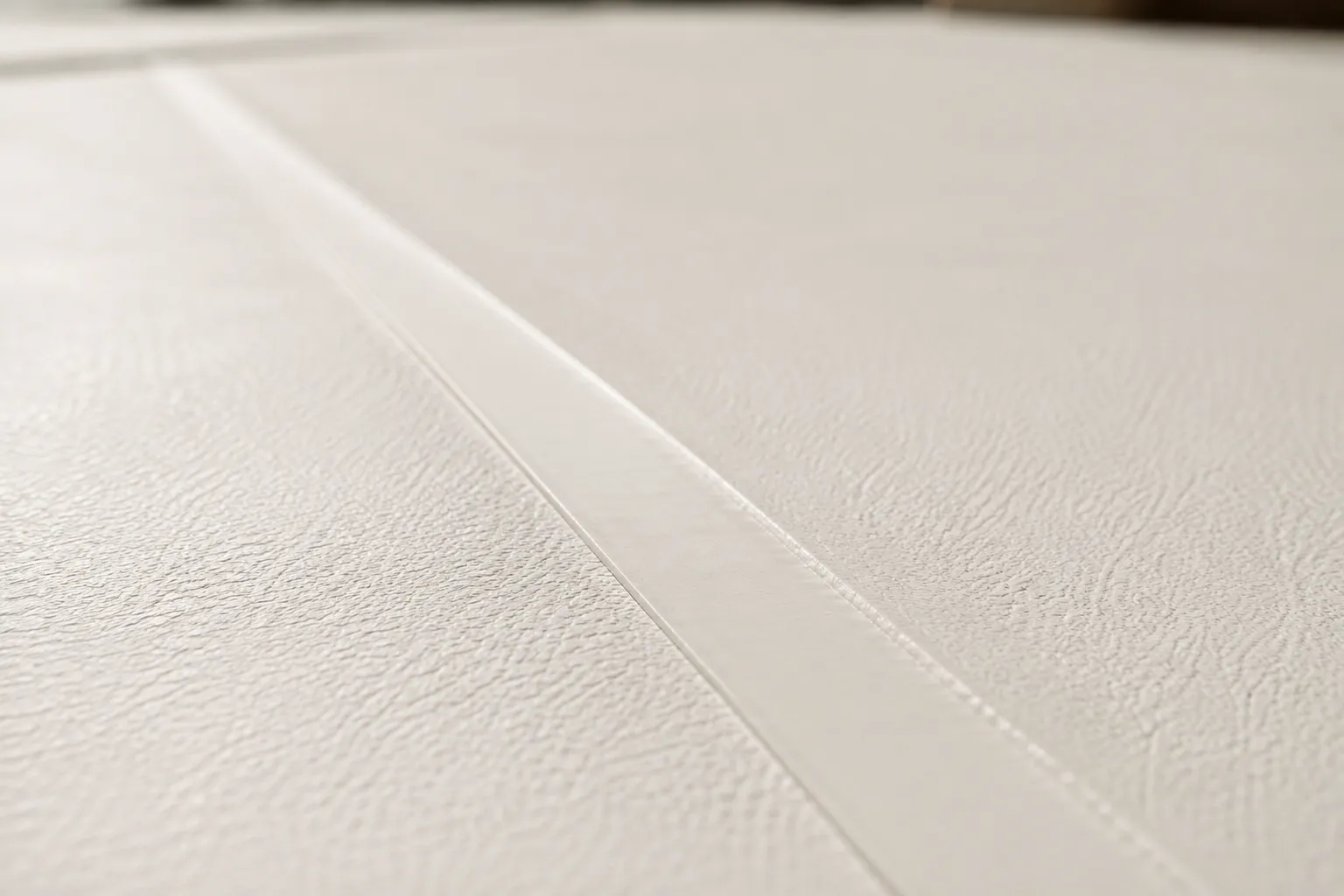 White TPO membrane with a heat-welded seam