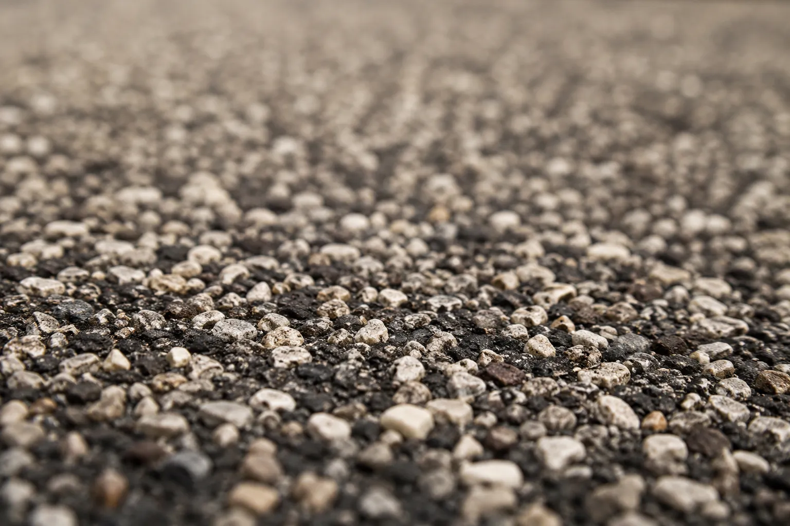 Built-up gravel roof surface, macro