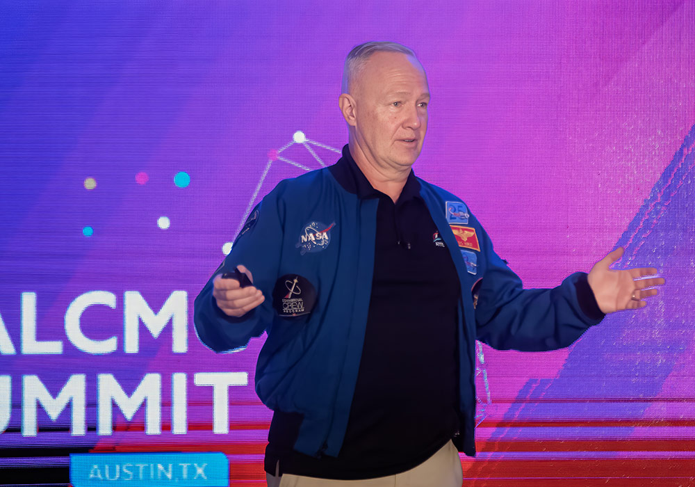 An image of Doug Hurley, Astronaut and U.S. Marine Colonel, delivering the keynote address at Digital CMC Summit 2025
