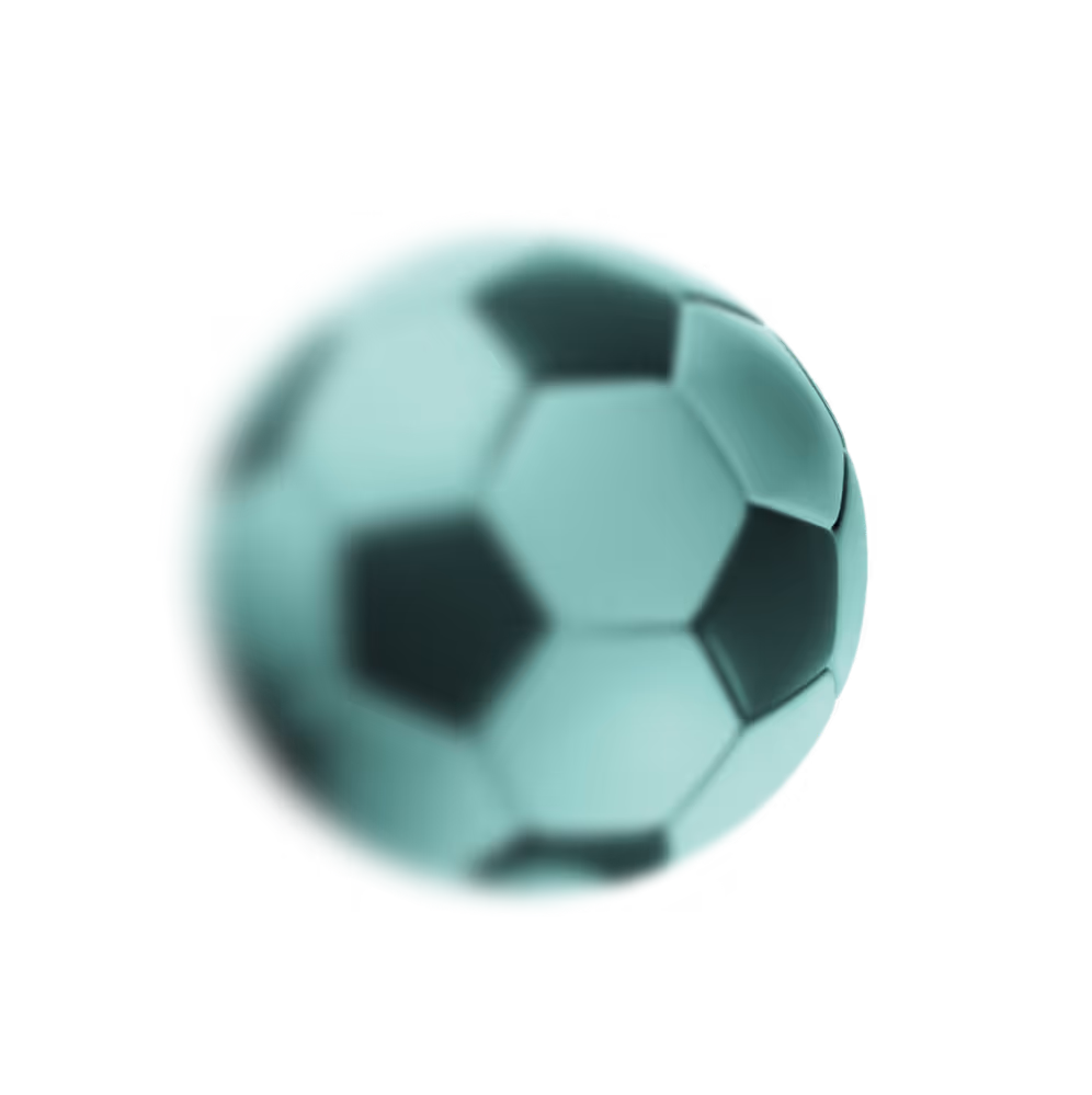Blurry soccer ball with black and light teal pentagon patches on a black background.