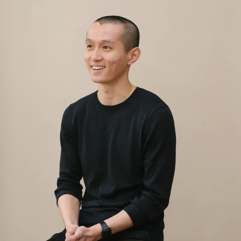 Luke Cheng seated