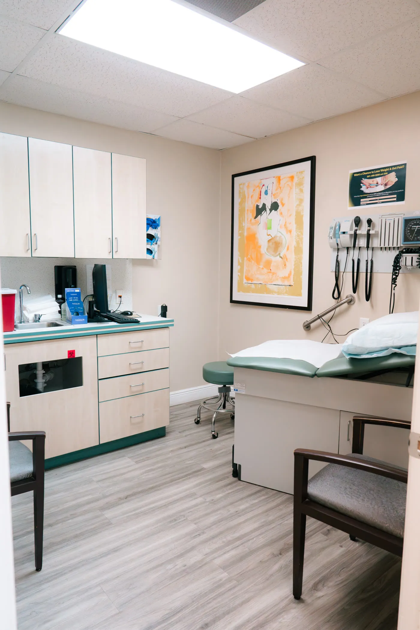Dr. Danielle Neuman welcoming a patient at the Personal Physician Care front desk