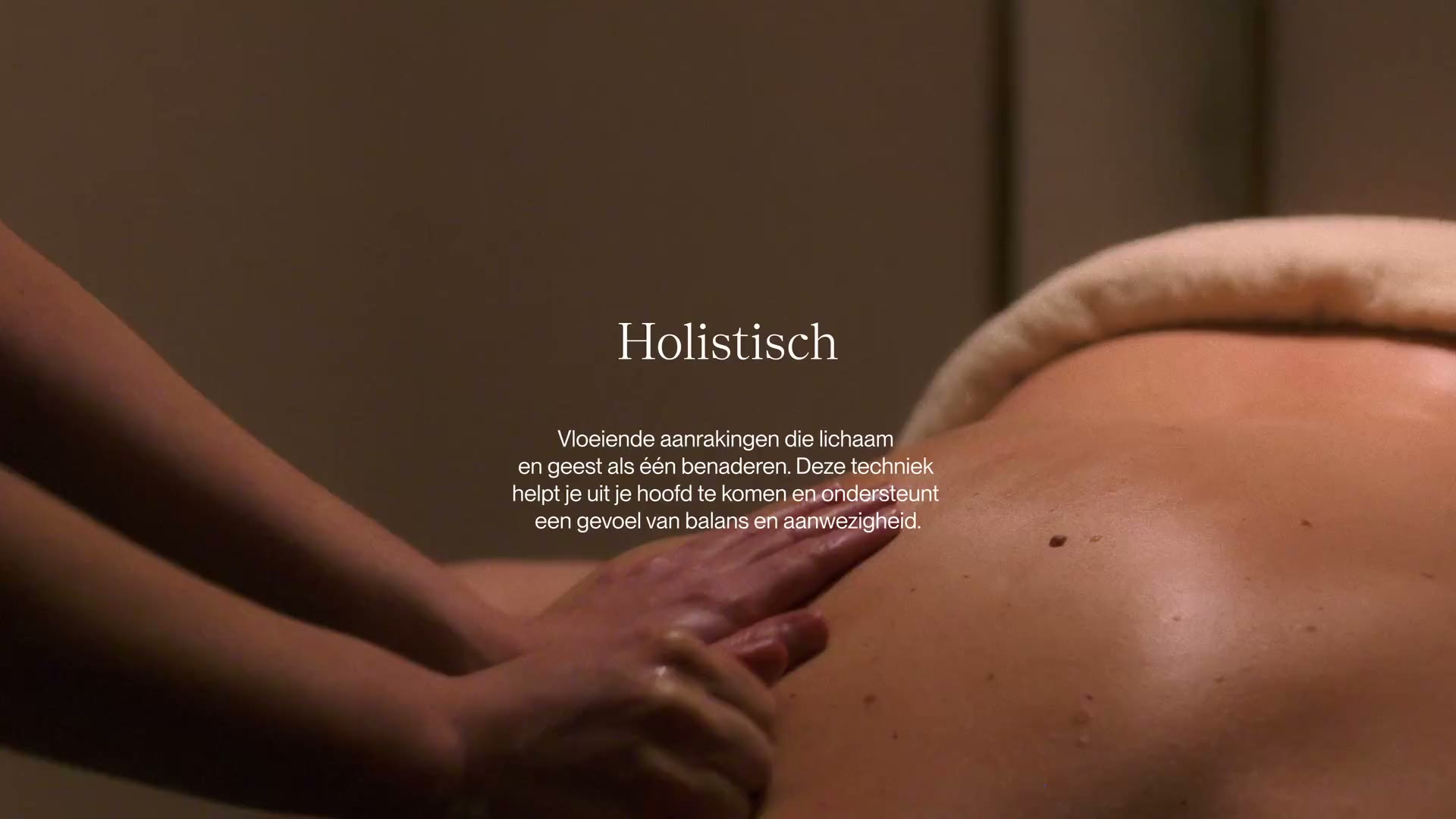 Holistic massage on a client's upper back at Studio Release
