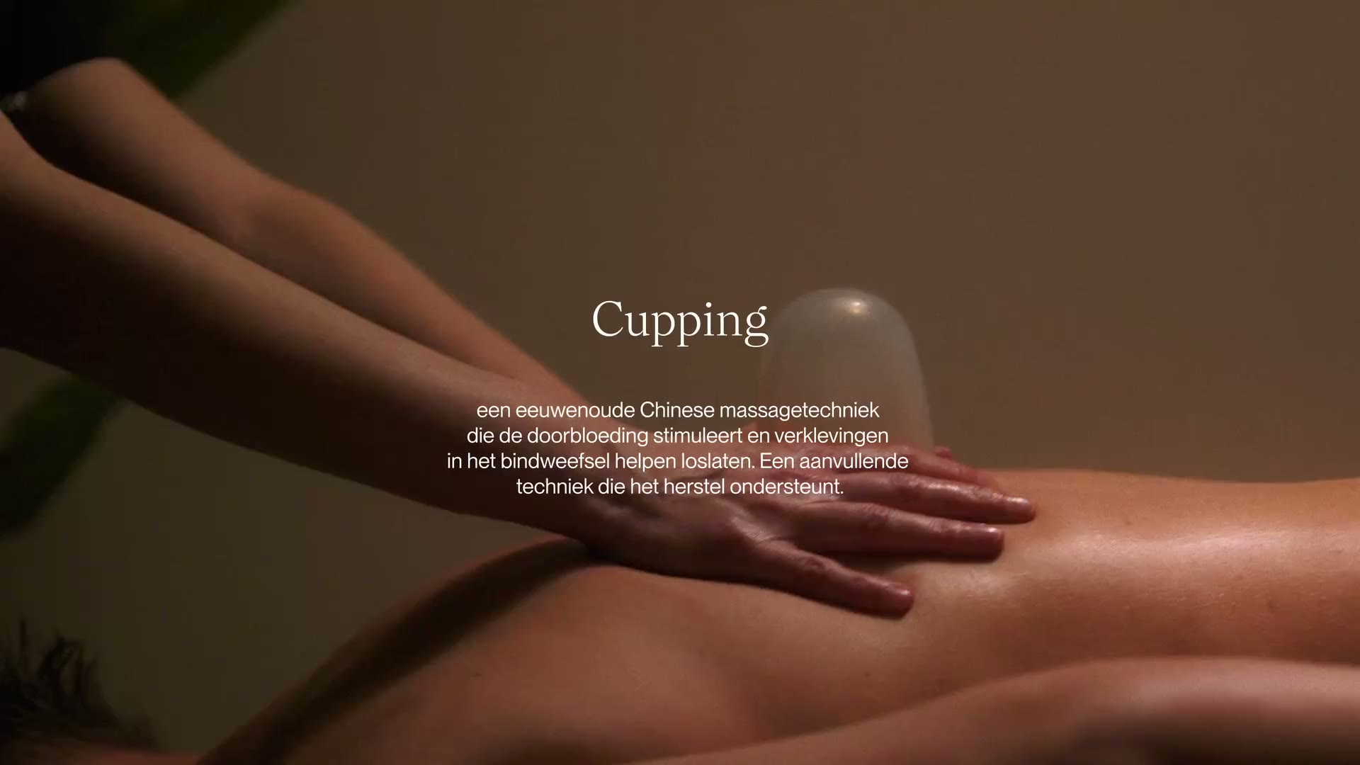 Cupping and massage on a client's back at Studio Release