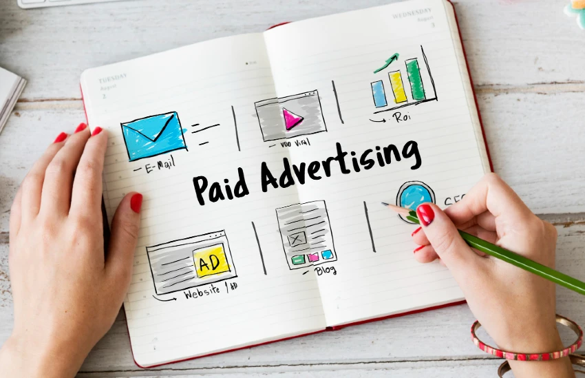Sketched ideas in a note book for paid advertising