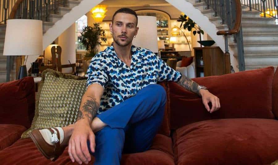 Mark Frost chilling on sofa in the lounge