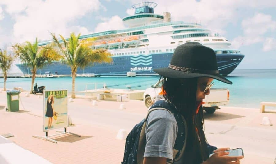Nori Harewood by the seaside with cruise ship in the background