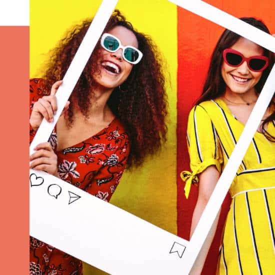 Happy influencers holding cradboard IG frame | College Life Today