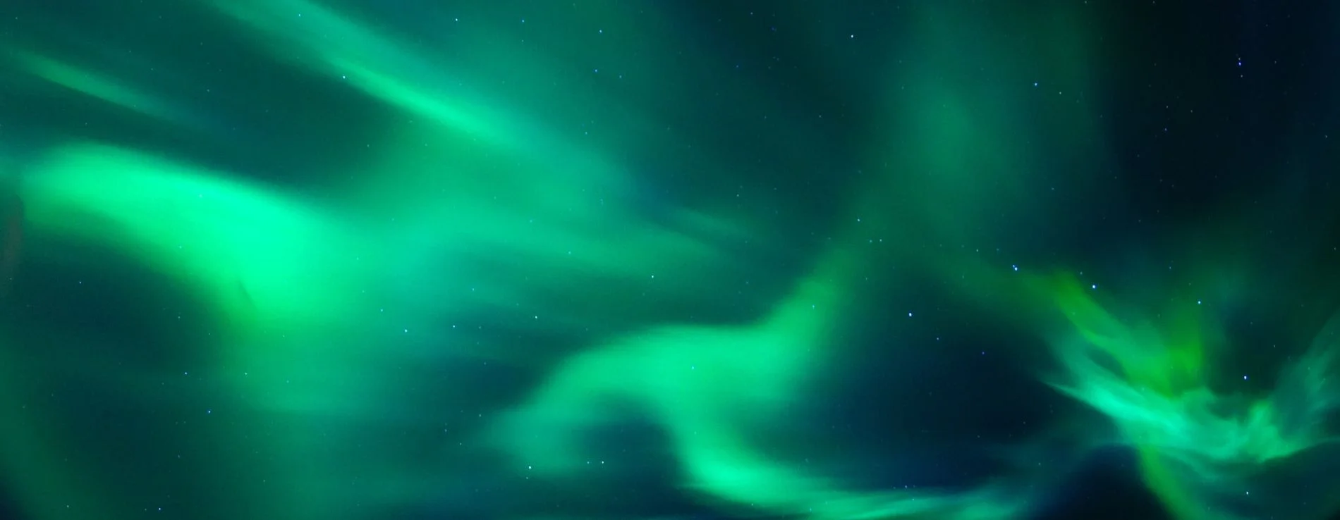 Iceland's Golden Circle view of Northern Lights Aurora in green.
