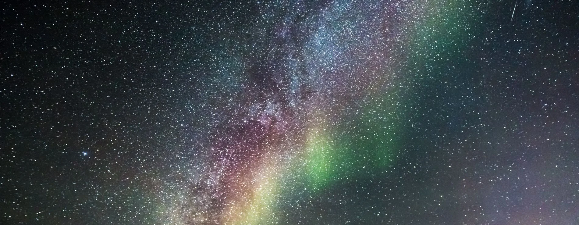 Colorful Aurora Borealis under a Starry Sky in Iceland.