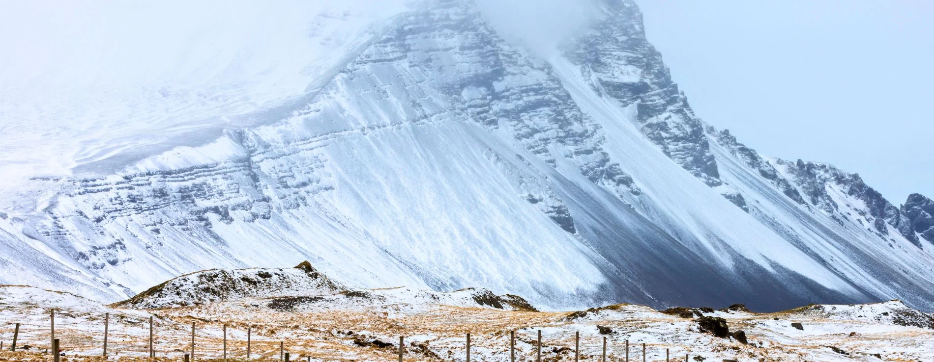 Hofn mountain covered in snow in winter.