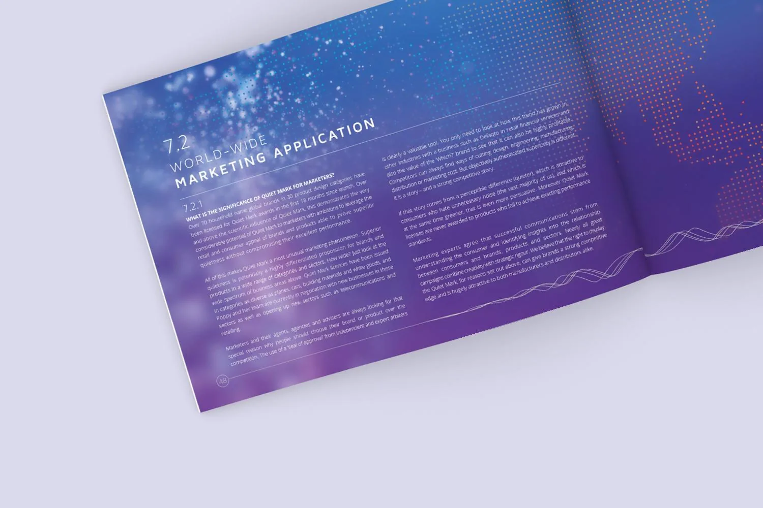 An open Quiet Mark brochure spread titled World-wide marketing application, in purple with a starry map