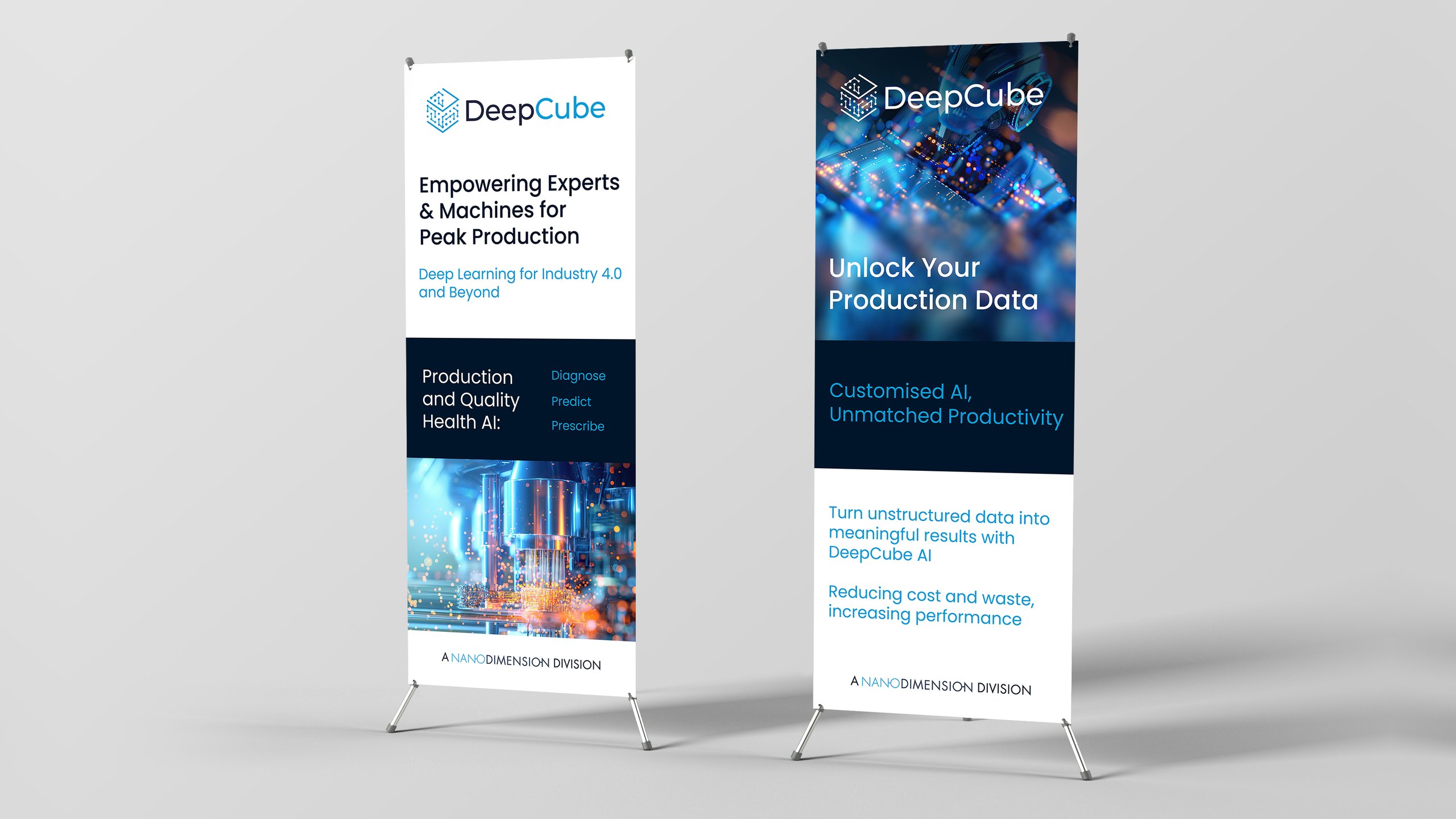 Two DeepCube roller banners on stands. One reads Empowering Experts and Machines for Peak Production above an image of glowing machinery; the other reads Unlock Your Production Data and Customised AI, Unmatched Productivity. Both end with A Nano Dimension Division.