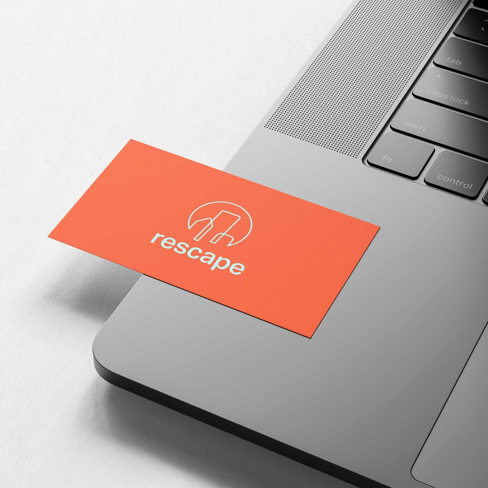 An orange Rescape card with the white building mark and wordmark, resting on a laptop