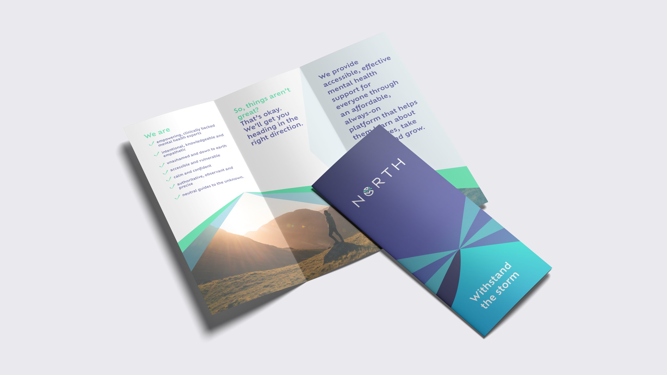 A North tri-fold leaflet with the cover line Withstand the storm, opened to show the brand voice list and the headline So, things aren’t great? That’s okay.