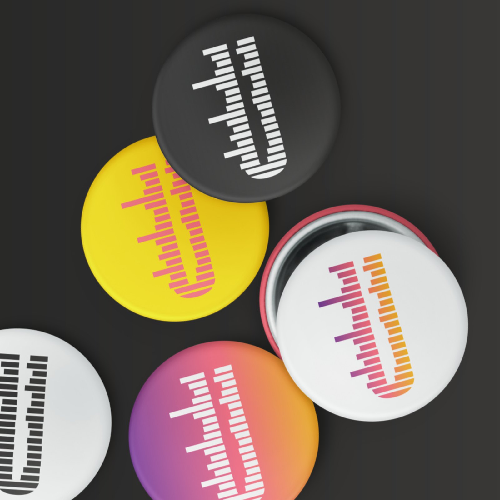 Untapped badges in black, yellow, white and gradient, each printed with the striped U mark, scattered on a dark surface