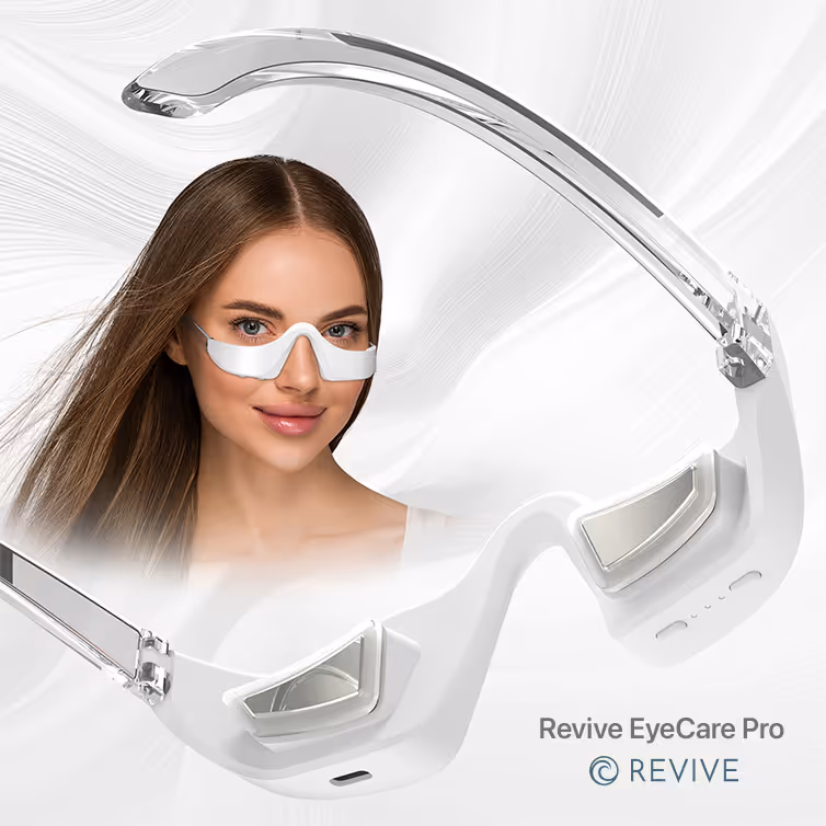 Smiling woman wearing a sleek, white eye care device that rests under her eyes with a modern, transparent frame surrounding her face.