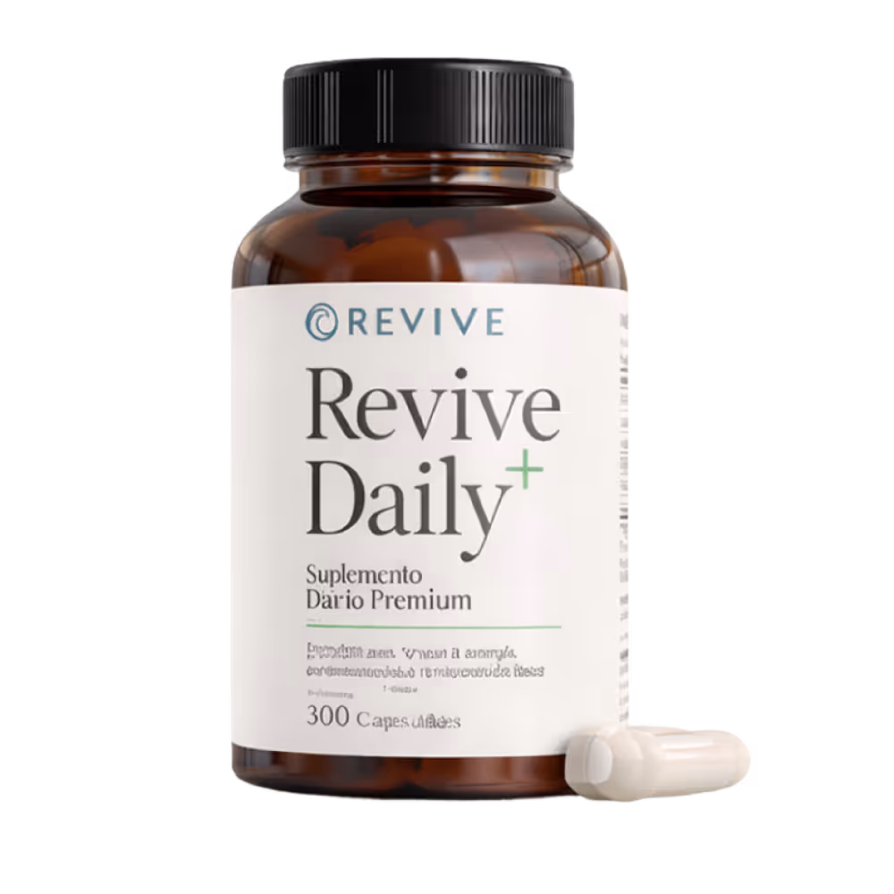 Botella marrón de suplemento Revive Daily con cápsulas blancas junto a ella.