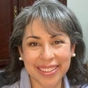 Imelda Hernandez smiling portrait headshot board member