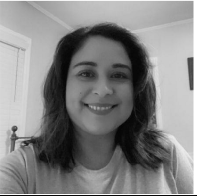 Ms. Sarah Garza smiling in staff profile photo