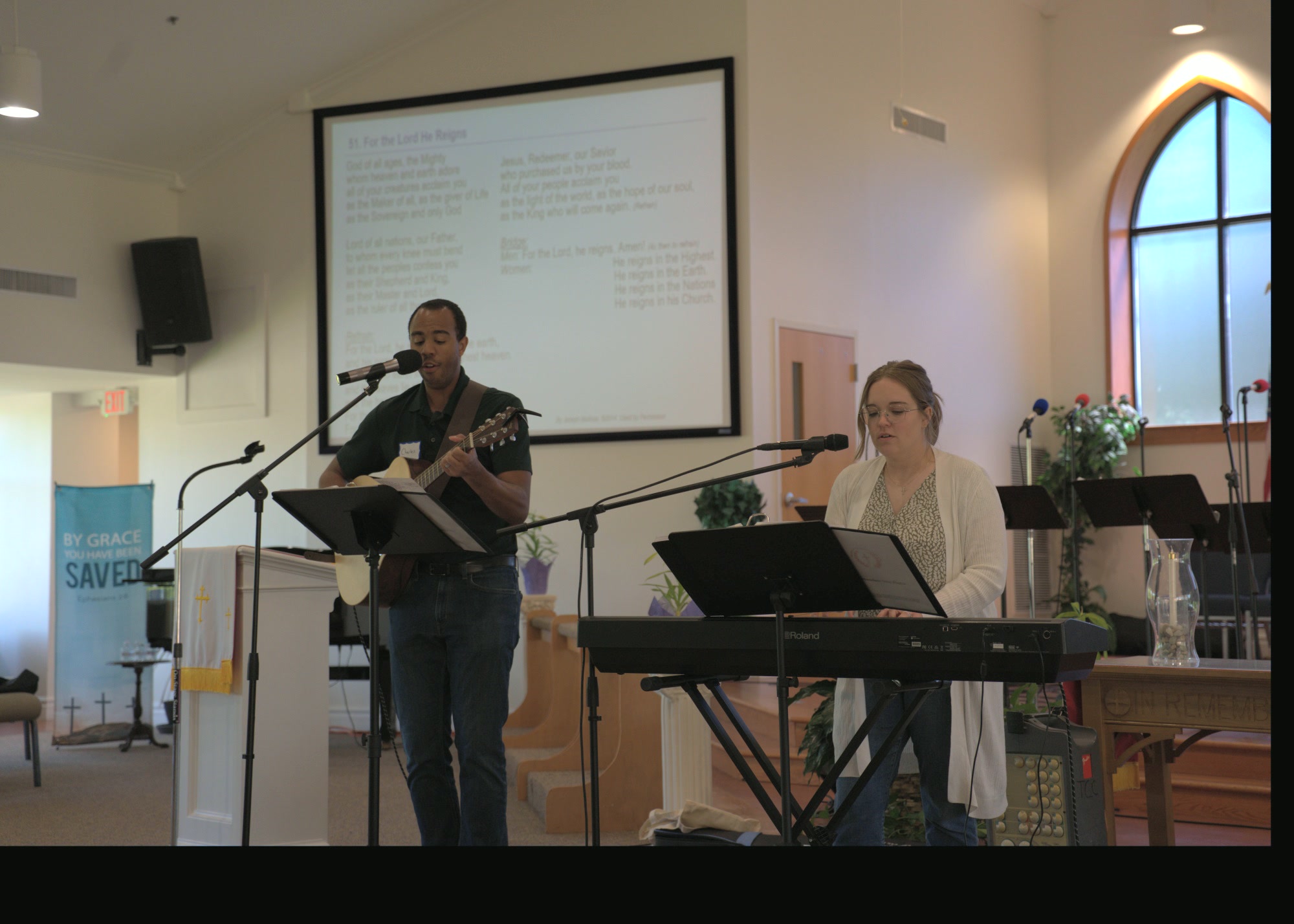 Praise and worship band leading a Triumph of The Cross gathering