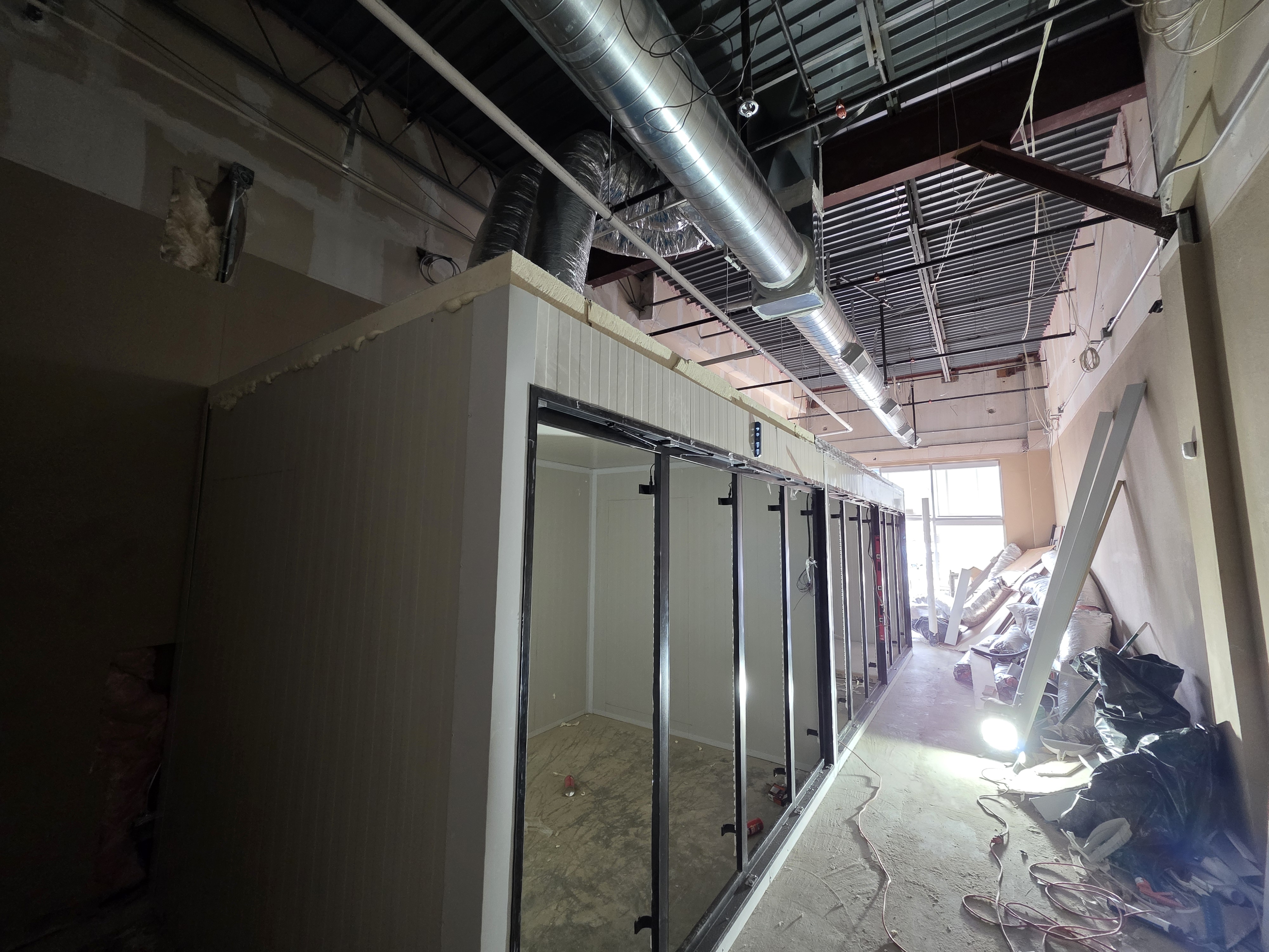 New buildout shell with framing and ductwork roughed in
