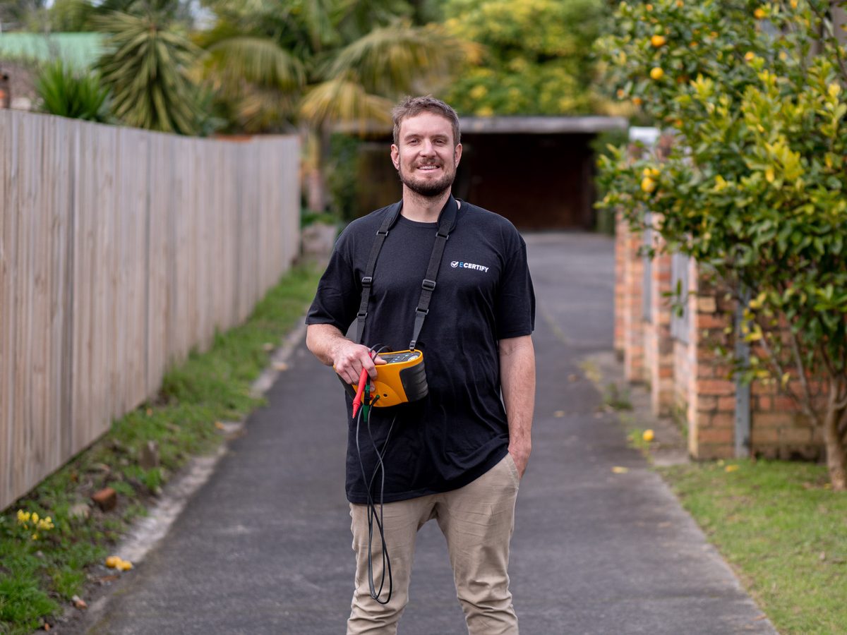 An eCertify electrician arriving at a property for a pre-purchase inspection