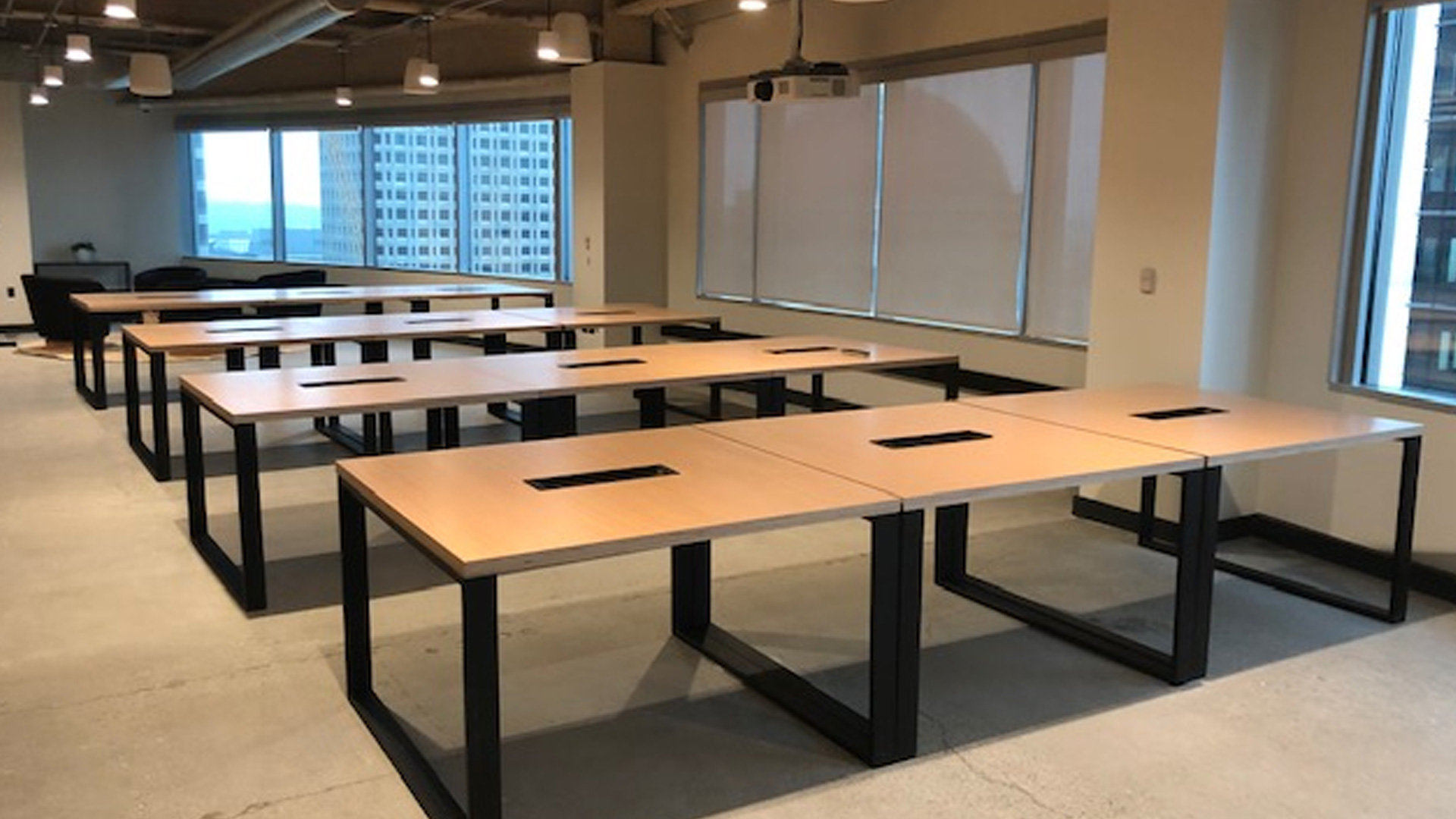We Work commercial office tables fabricated and installed by burke gibson llc
