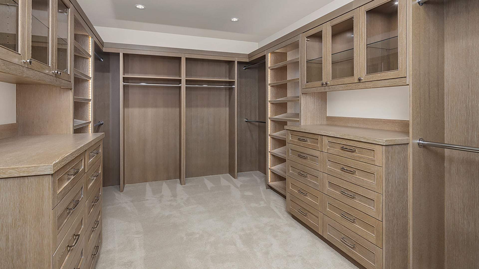 walk in closet fabricated with quality craftsmanship and detail with no clothes yet