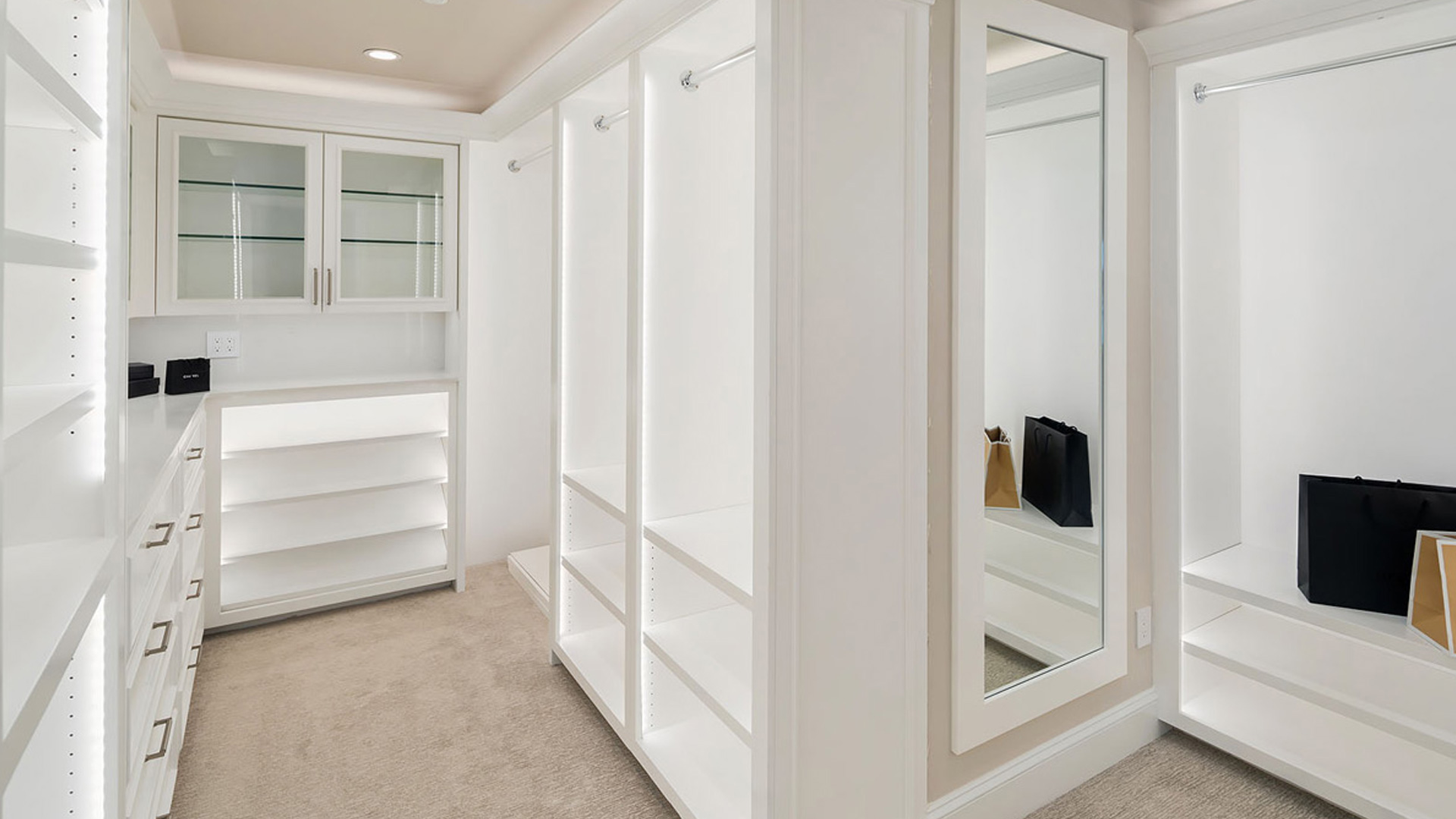 walk in closet with quality millwork and framing