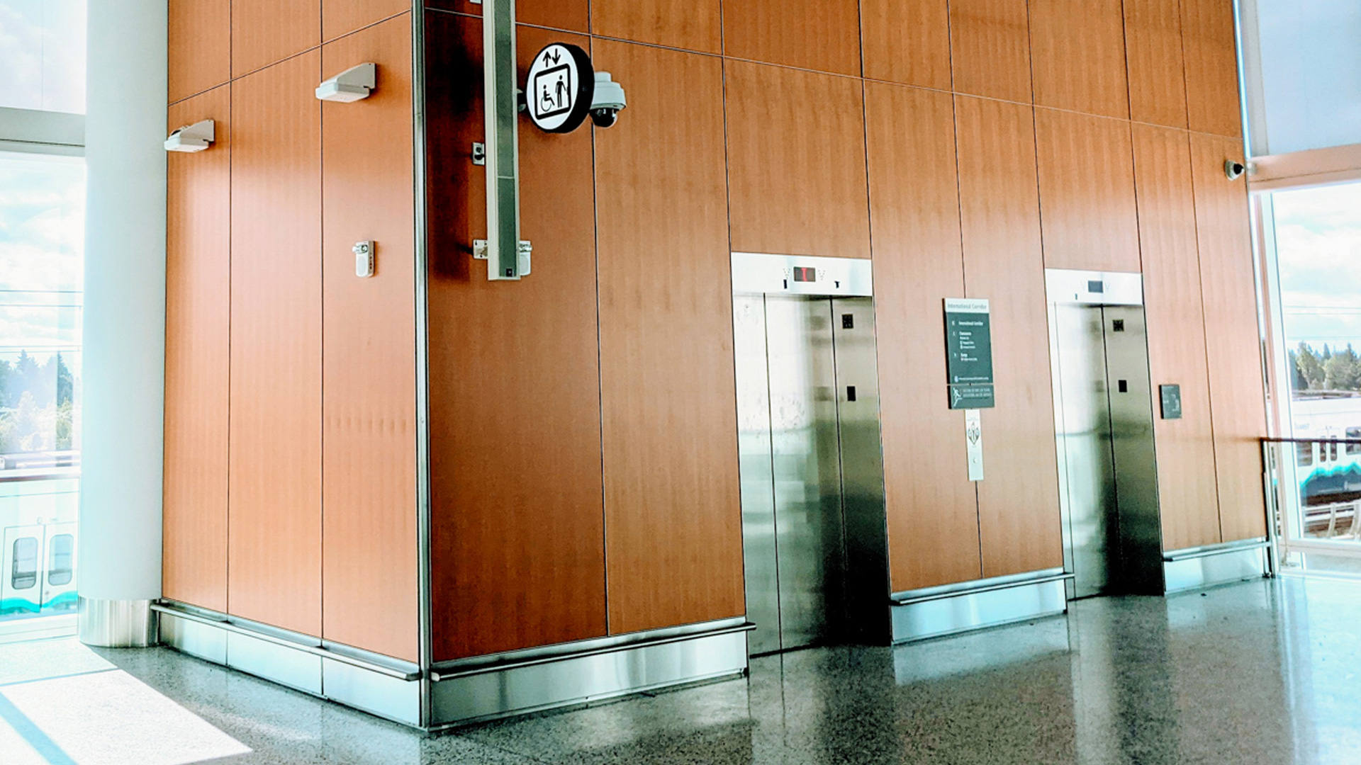wall panels on elevator in seatac airport fabricated and installed by burke gibson llc