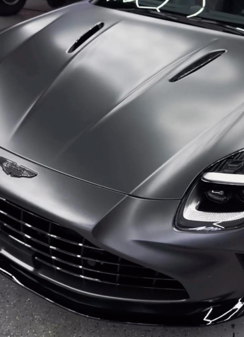 Satin black wrap detail on a luxury car