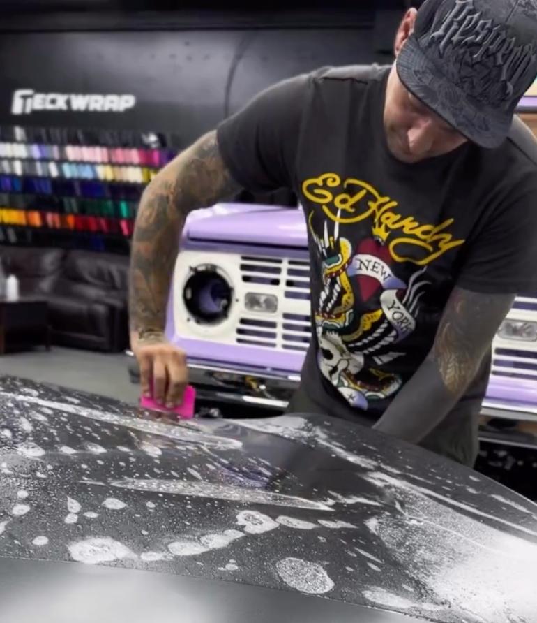 Front-end paint protection film install in progress at Wrap Me USA serving Fort Lauderdale and Boca Raton