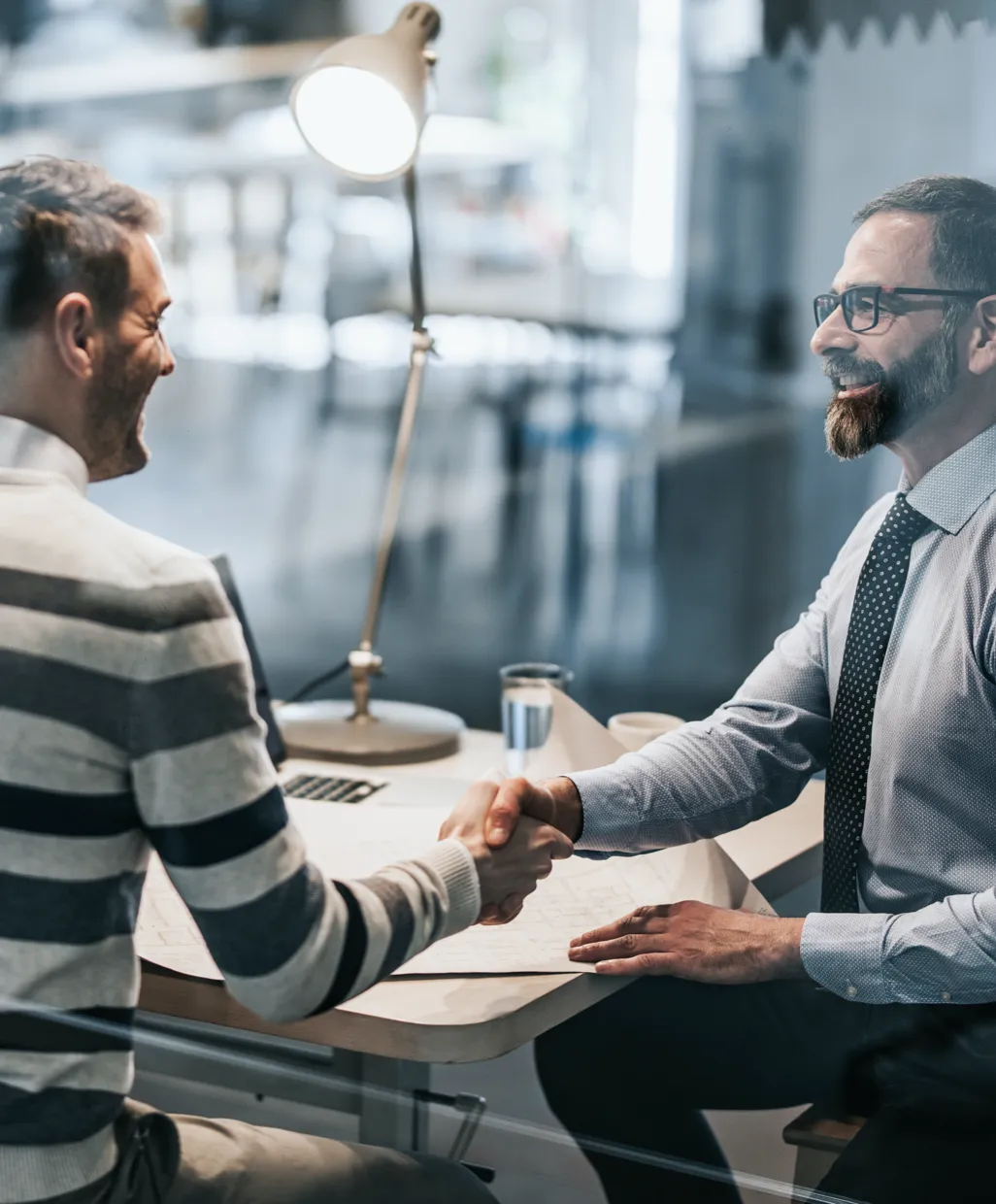 Handshake representing investment real estate partnership at Firstrust Bank
