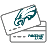 Two credit cards overlapping, one with an eagle logo on it.