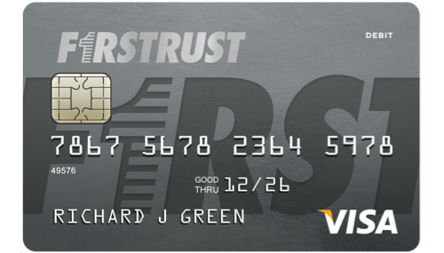 Gray FirstTrust debit Visa card with chip, card number, name Richard J Green, and expiry 12/26.