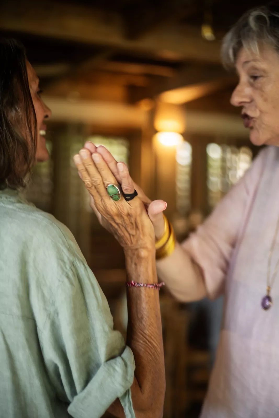 Connecting hands mindfully during an intimate gathering workshop at The Shaba Shala.