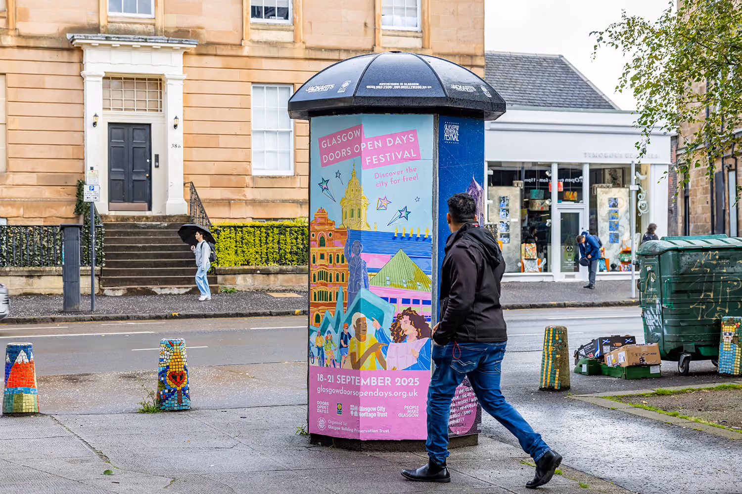 Glasgow Doors Open Days Festival poster displayed on a city street