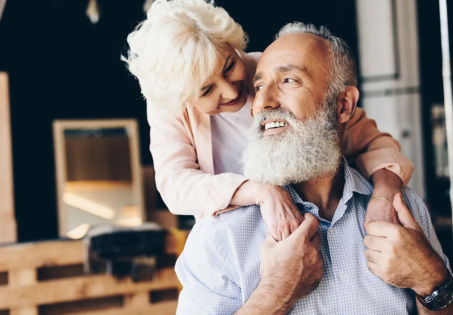 Older couple listening to each other